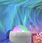 AuroraGlow Mini Night Light in Pearl White, close up with aurora colours glowing on top